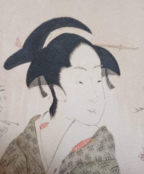 BELLEZA-JUNTO-A-CEREZO-EN-FLOR.-DETALLE-ROSTRO